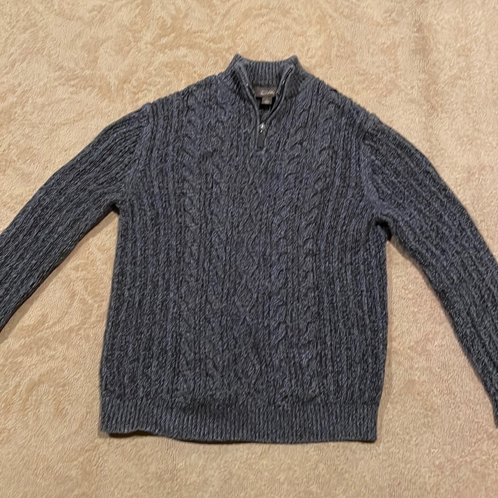 - Cable knit mens sweater.